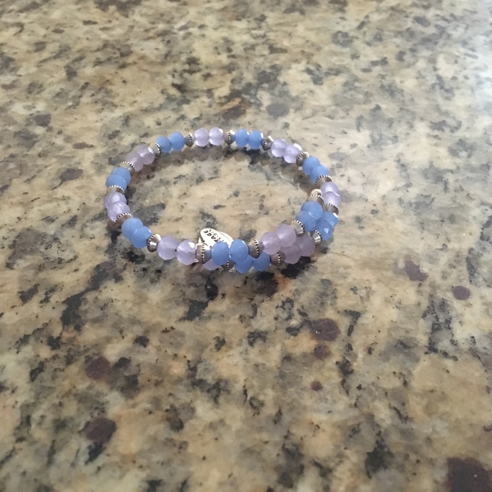 Lite Blue Alex and Ani wrap bracelet.